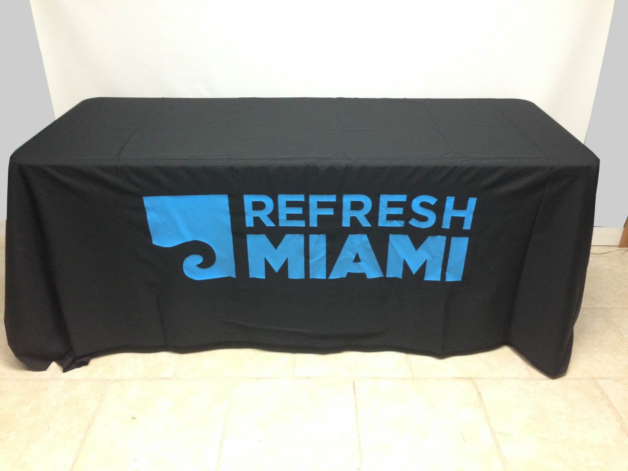 Imprinted Table Covers To Help Your Business Stand Out At Trade Shows