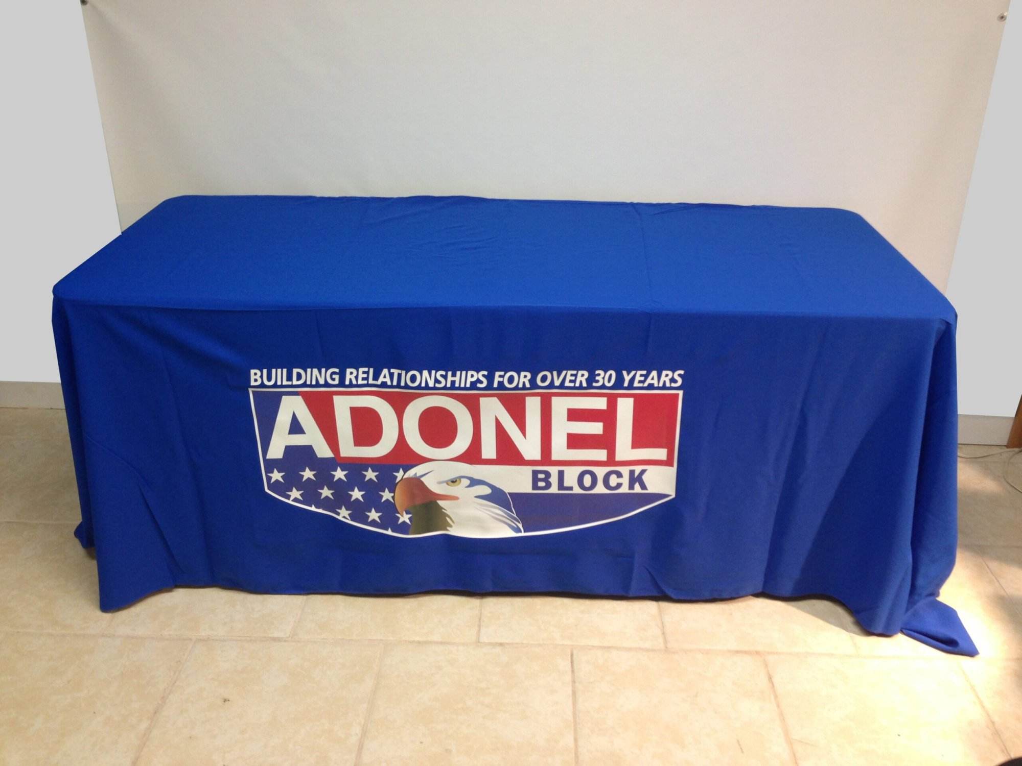 Imprinted Table Covers To Help Your Business Stand Out At Trade Shows