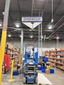 Sign Installation Services In Miami Warehouse Ceiling Signage Installation Scaled