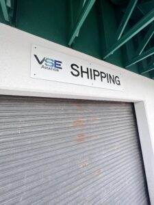Top Types Of Business Signs In Florida For 2025 Aviation-Shipping-Warehouse-Sign