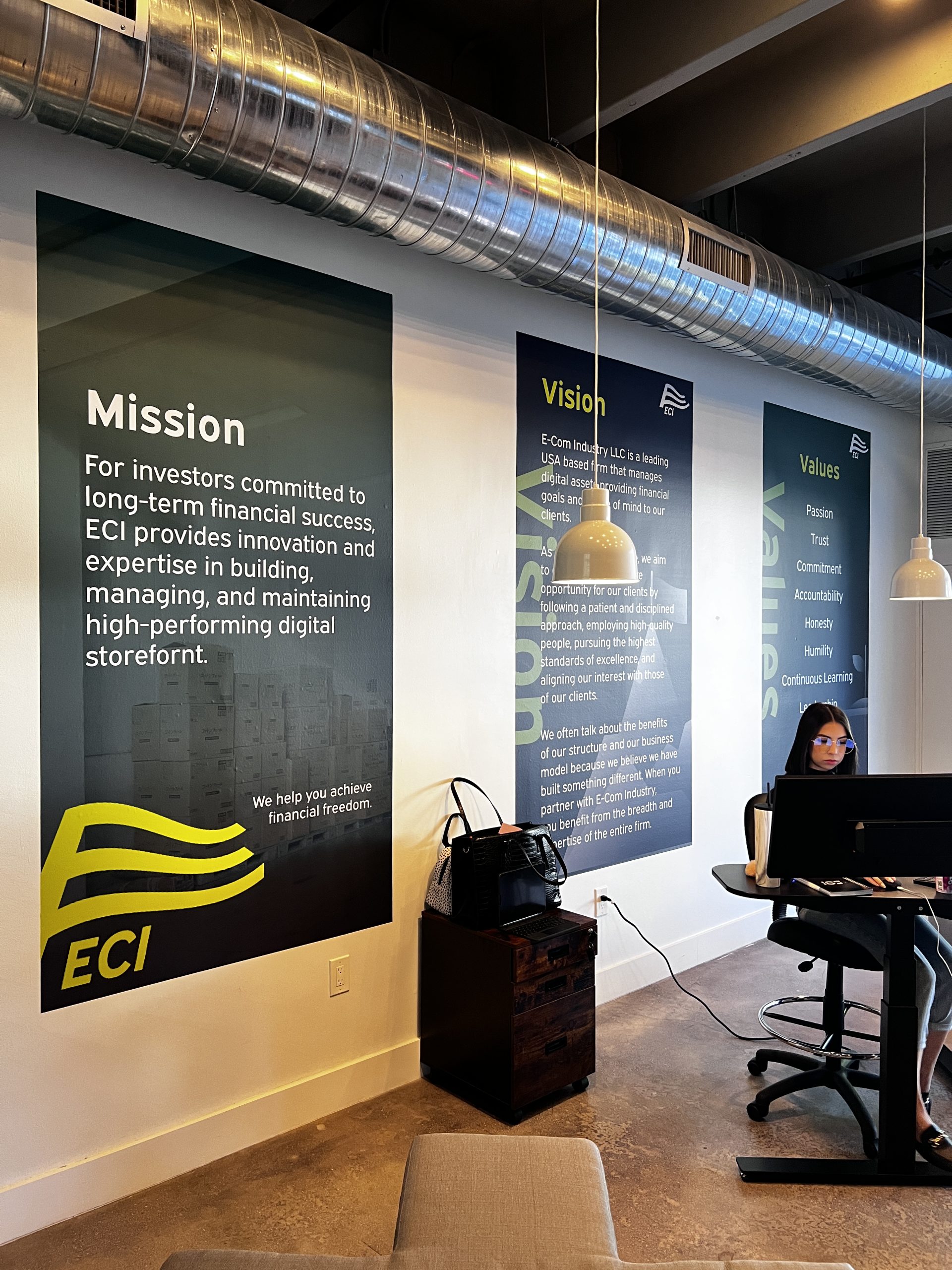 Doral Office Signage And Frosted Glass Graphics | E-Com Industry Wide E-Com Industry Lobby View With Mission, Vision, And Values Murals Installed Along The Wall
